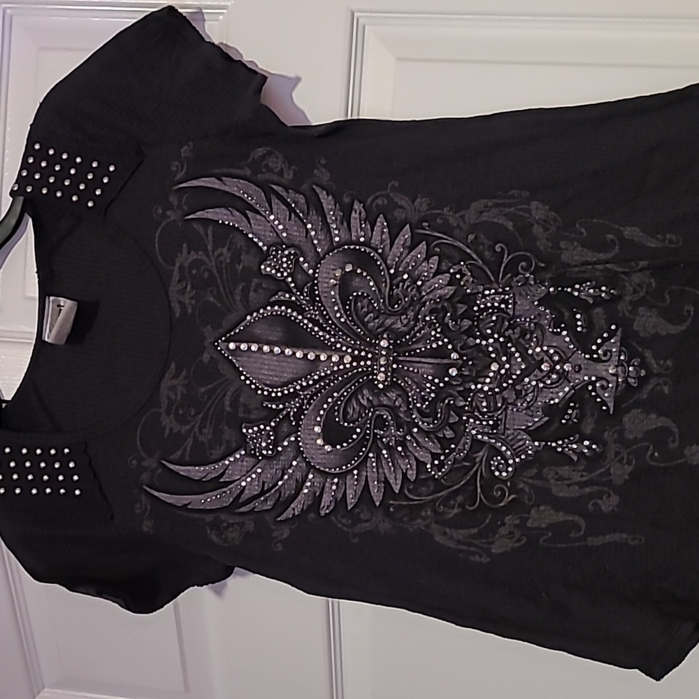Ladies top size M,studs on shoulders and studs and crystals. Finished/unfinished